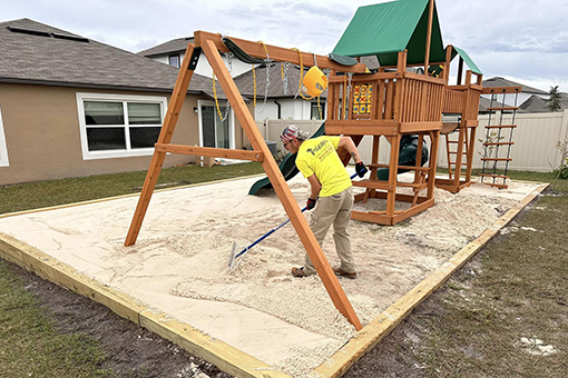 Commercial Landscape Design Company's Employees Building a Playground in Wesley Chapel FL