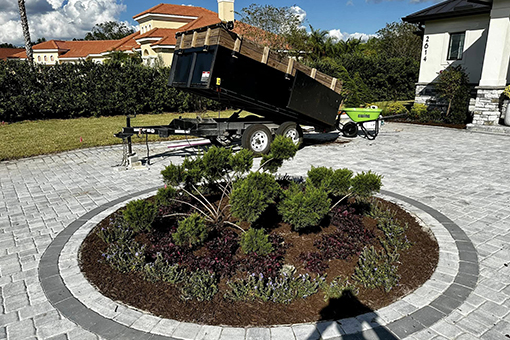 Ongoing Mulching on the Lawn of a Commercial Building in Wesley Chapel Florida