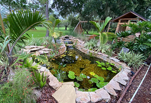 Beautiful Water Feature Installed by a Landscaping Company on a Commercial Lot in Wesley Chapel