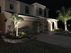 Well Lit House in Wesley Chapel Florida After Lawn Care Company Installed Landscape Lighting
