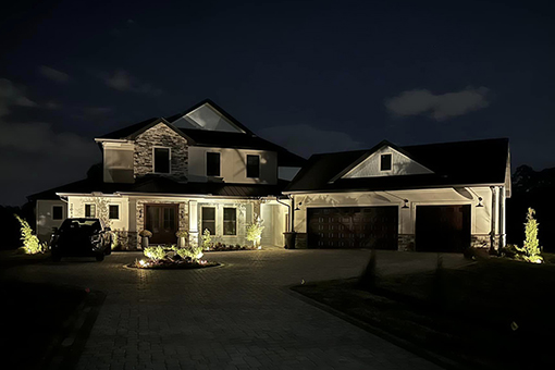 Well Lit Residential House in Wesley Chapel Florida After Installing Landscape Lighting